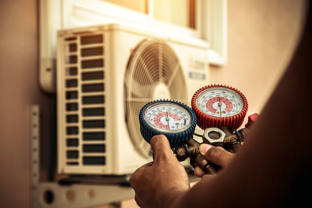 Professional Ac Installation technician working in Bunker Hill, IN